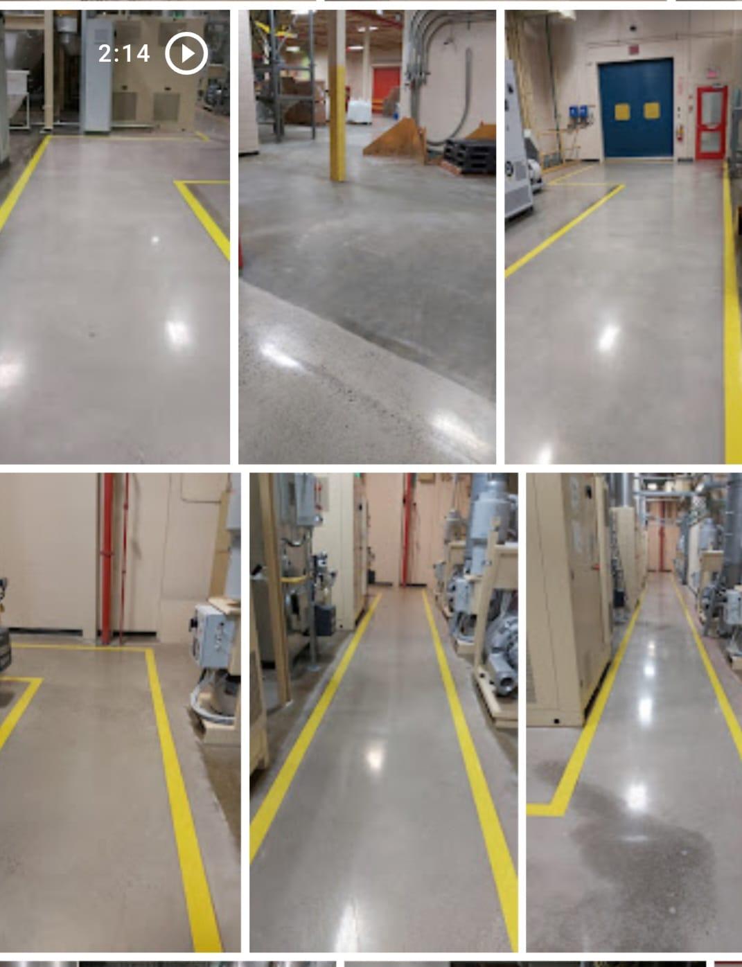 Industrial polished concrete with safety markings by Butterfly Floorings